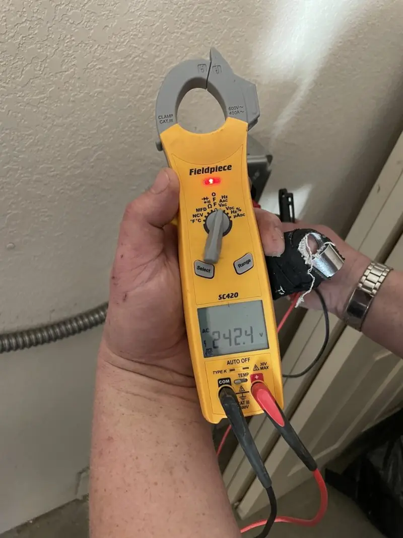 Voltage testing with clamp meter during Circuit Breaker Repair in Lopatcong